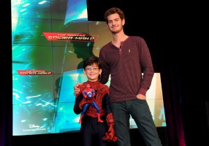 Actor Andrew Garfield, right, and co-star Jorge Vega help Disney Consumer Products unveil an innovative assortment of toys inspired by The Amazing Spider-Man 2 by Sony Pictures Entertainment (Photo by Diane Bondareff/Invision for Disney Consumer Products/AP Images)